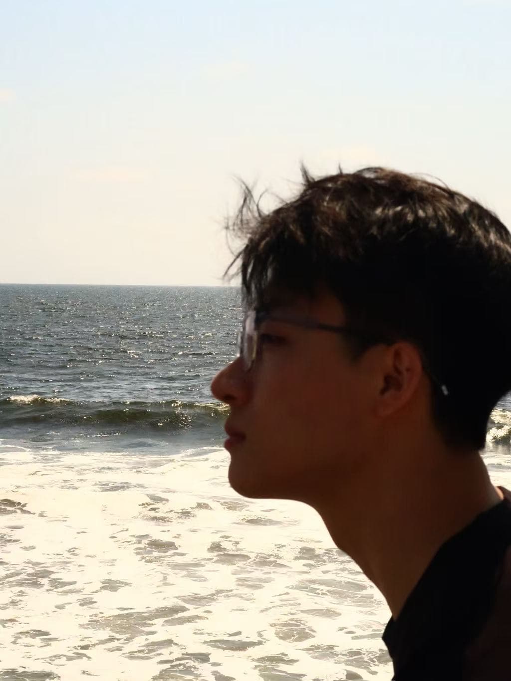 Profile portrait by the ocean