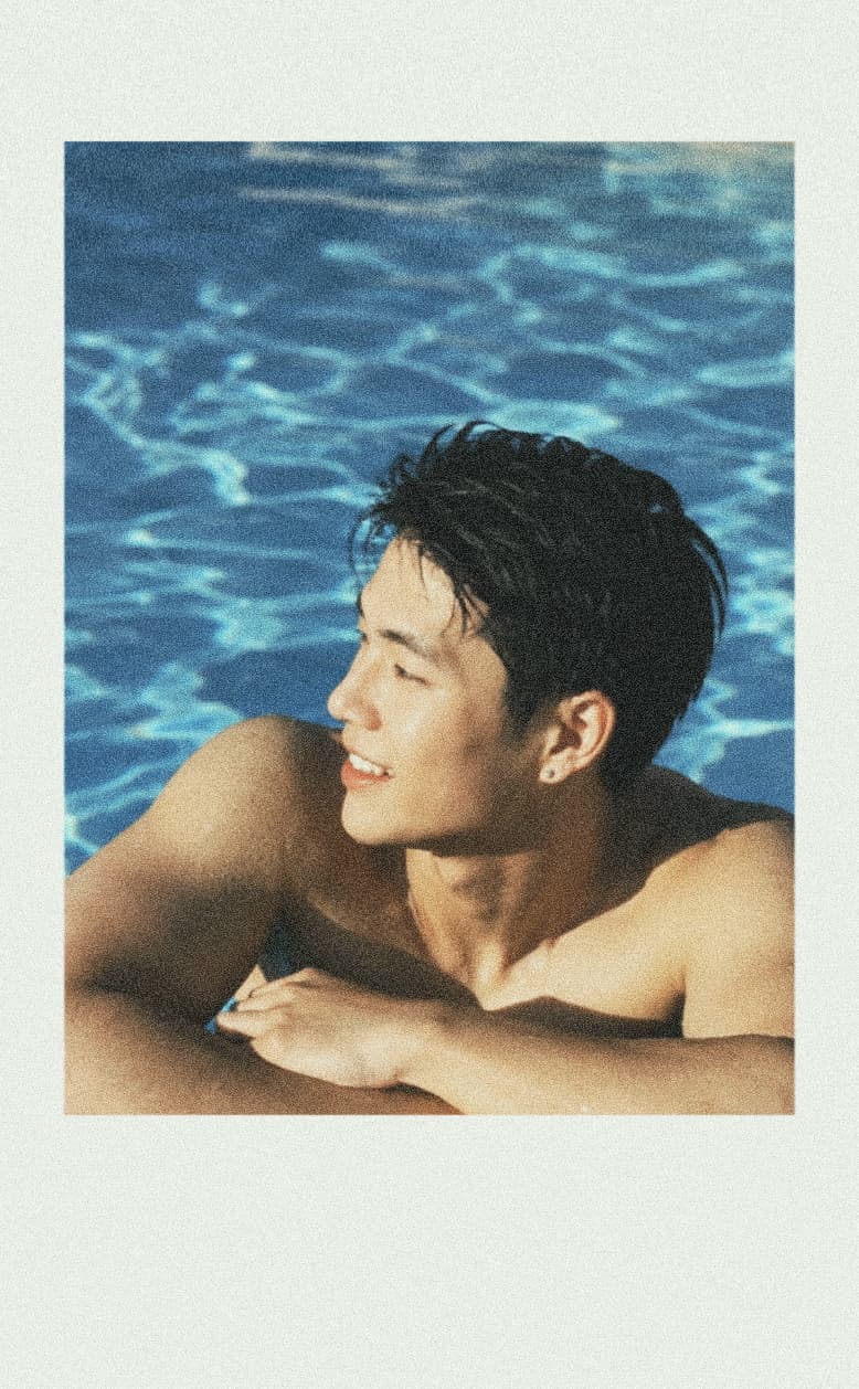 Poolside portrait with film grain